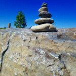 A small rock cairn awaiting our arrival at the cabin. I am sure a prior camper built this. I did not see any others in the campground. 2019-07-20_Bozeman_Hotsprings-01