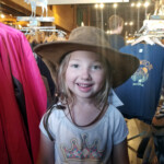 Trying on a cowboy hat. 2019-07-29 Back _Yard Elk