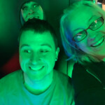 Brian and his mom being photo bombed by Jessica! Dave-n-Busters_20191208