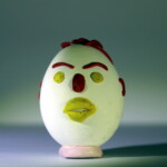 Tried using two lights on on each side of me. Photography Egg Challenge